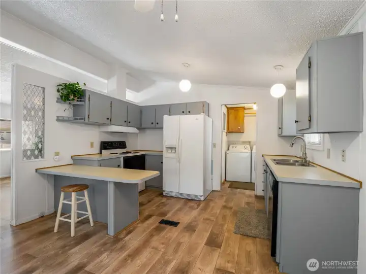 Laminate flooring in the common areas and new carpet in the bedrooms. Fresh paint throughout. Laminate flooring in the common areas and new carpet in the bedrooms. Fresh paint throughout.