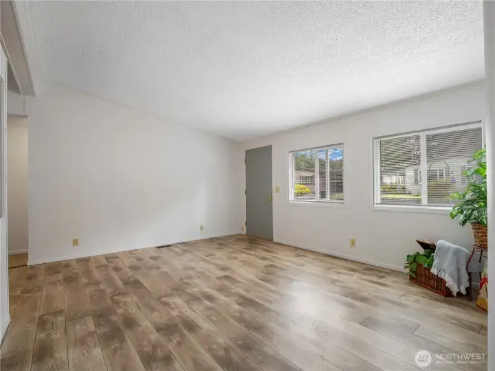 The living room has a view of the street so you will not miss a thing The living room has a view of the street so you will not miss a thing