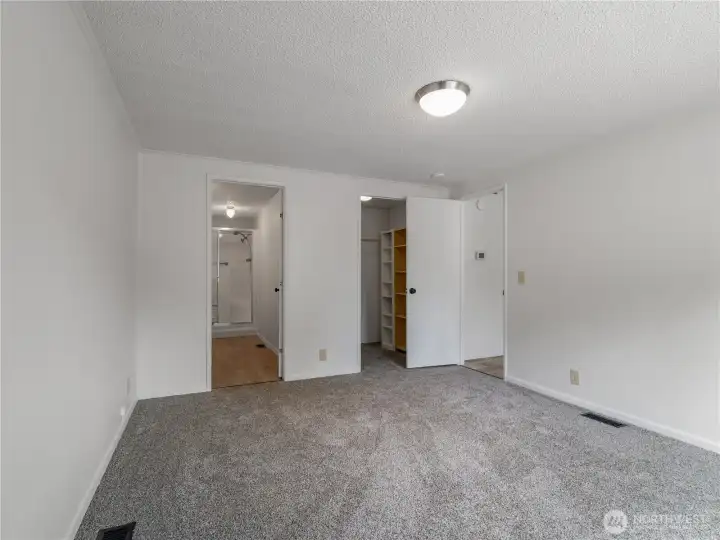 The primary has an en suite and walk in closet The new carpet is plush. The primary has an en suite and walk in closet The new carpet is plush.