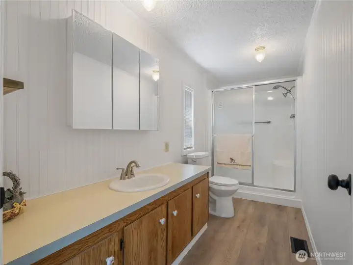 New bathroom cabinet, new shower doors, new sink and fresh paint. New bathroom cabinet, new shower doors, new sink and fresh paint.