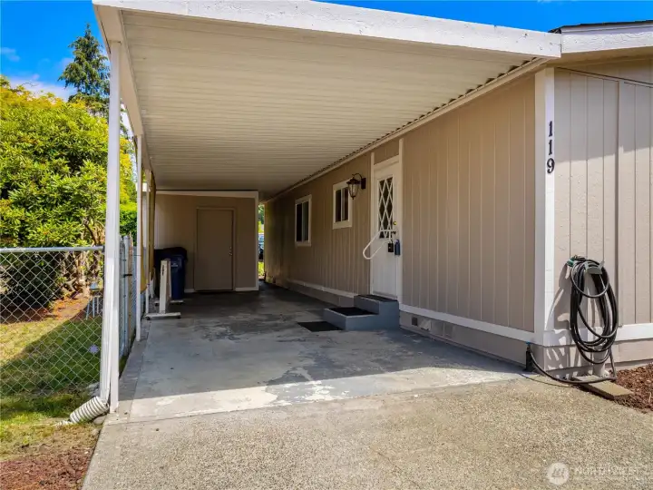 The carport has room for one car but the drive way can hold two regular sized cars in addition. The carport has room for one car but the drive way can hold two regular sized cars in addition.