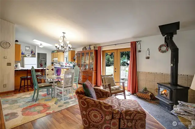 View from sitting area into the eating space and kitchen