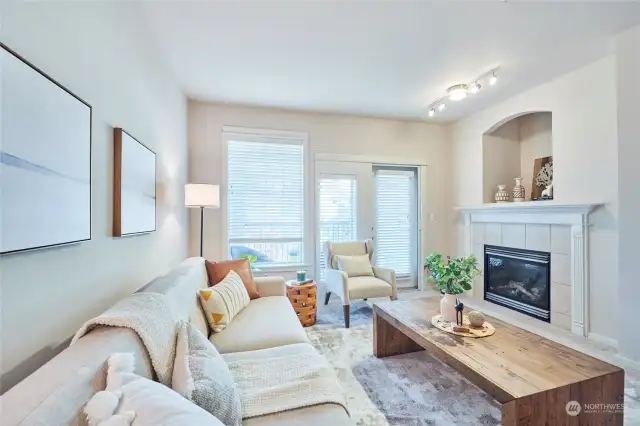 Enter a lovely living room with gas fireplace