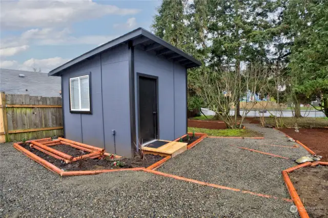 Heated outbuilding for office or other living space just a few steps from your door.