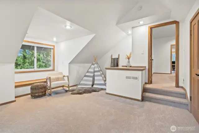 A dedicated play area within the expansive bedroom ensures fun and imagination are always close at hand.