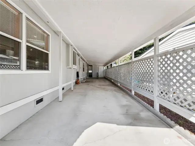Your carport is extra deep! Easily fitting 2-3 cars, with a nice storage shed at the back.