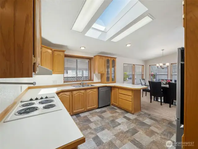 Kitchen view from hallway leading to dining.