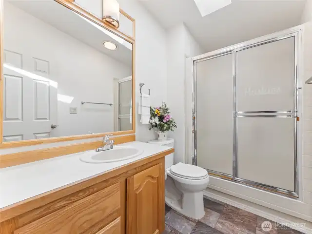 Kids/guest 3/4 bath.
