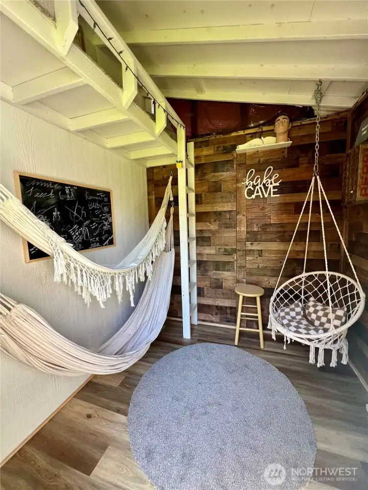 Shed with storage and an improved bonus space currently setup as a "Babe Cave" that could easily be your teen hangout, yoga space, reading nook or small hobby studio!