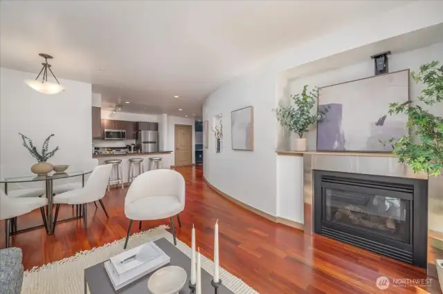Ample living/dining/kitchen space with pass through fireplace.