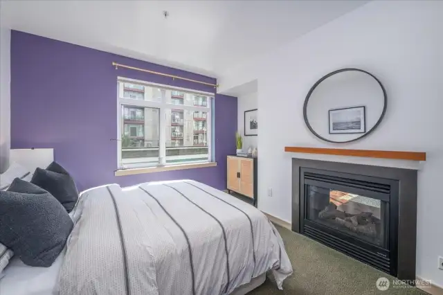 Primary bedroom with pass through fireplace.