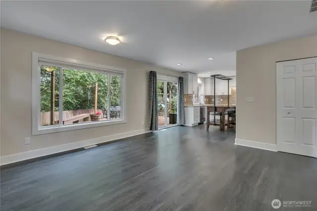 Slider off the kitchen leads to gorgeous backyard