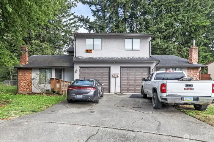 Each unit has their own garage and driveway parking.