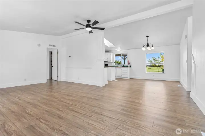 Large open liv room opens to dining and kitchen