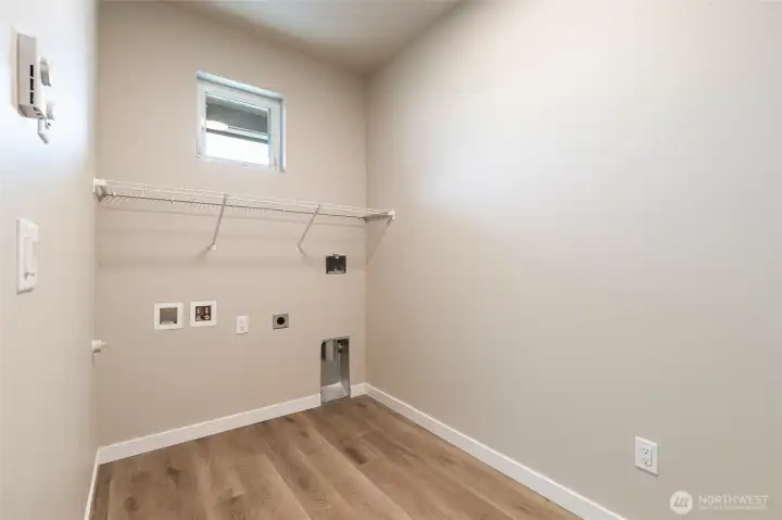 Laundry room pic for reference of like unit. 555 Northview is under construction.
