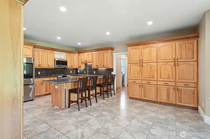 Informal Dining Area with a Breakfast Bar...and amazing storage space.