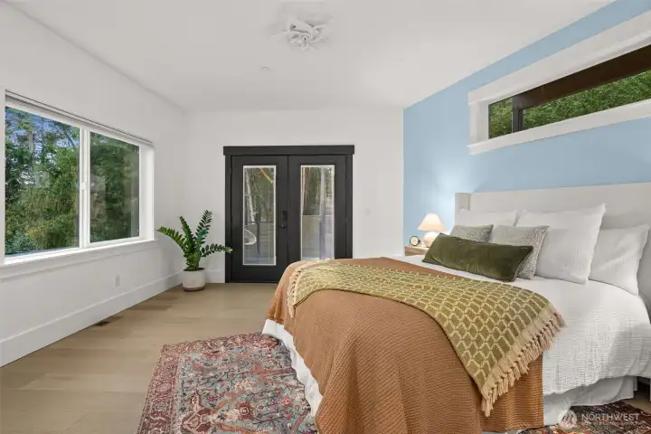 Main Floor Owner's Suite:  Wake up inspired to morning views.