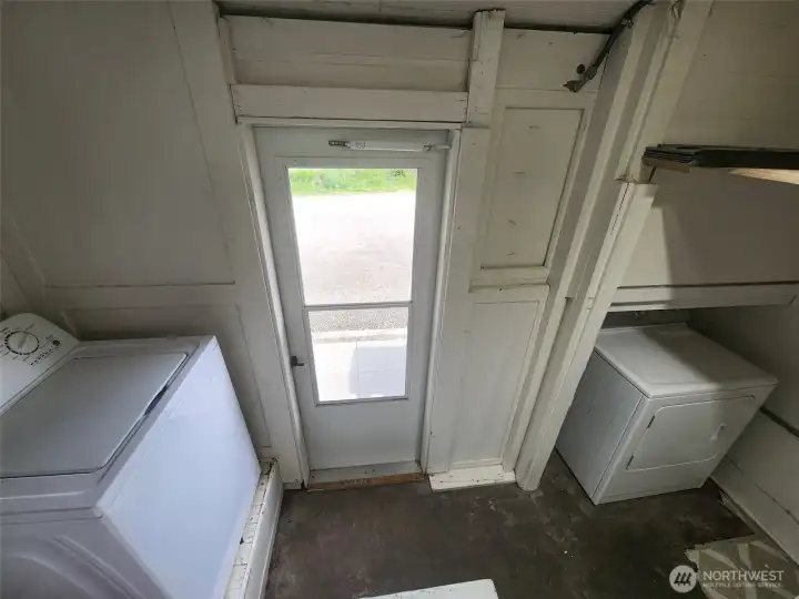 Utility room at back of unit A