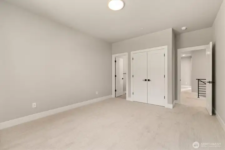 Bedroom with ensuite bathroom on upper floor