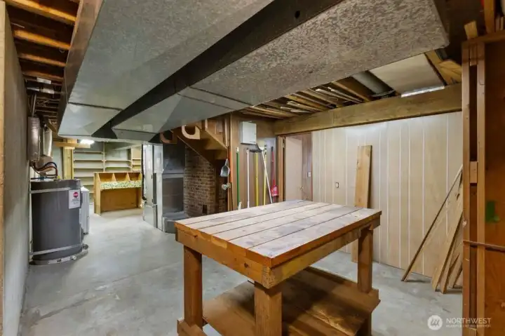 Additional view of the shop opening to the utility room and craft area.