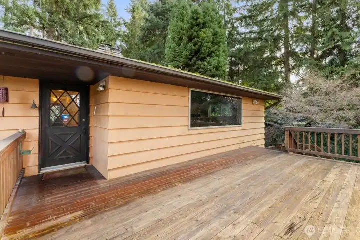 Large front deck and main entry. Home features a newer furnace and hot water heater, large storage shed and more!