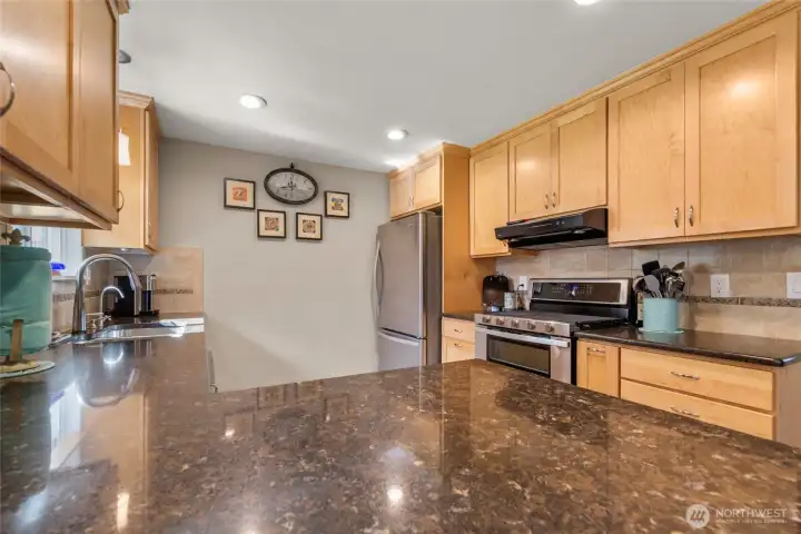 5 burner double oven gas stove with 30 amp breaker available behind the range.