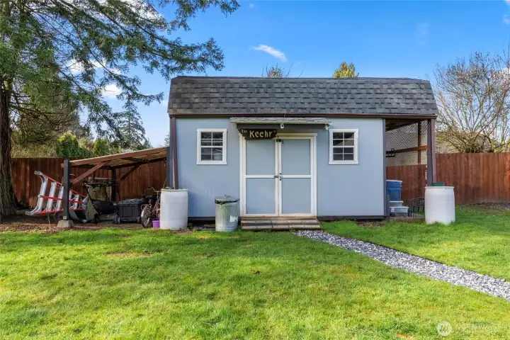 10 x 16 barn style shed with above head storage and overhang.