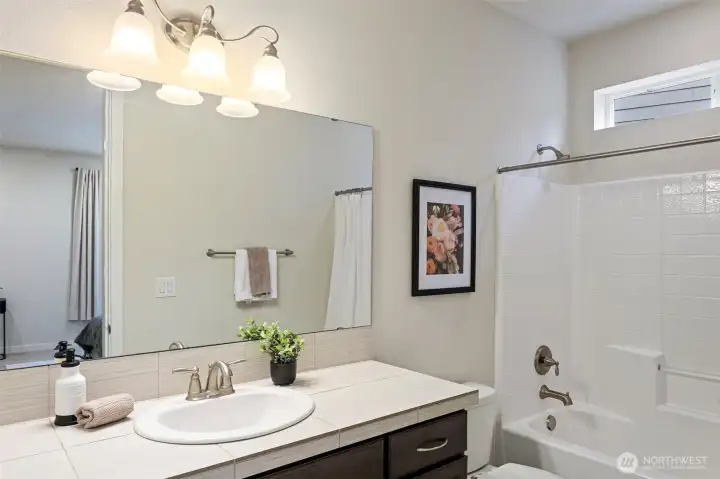 En suite off of main floor bedroom