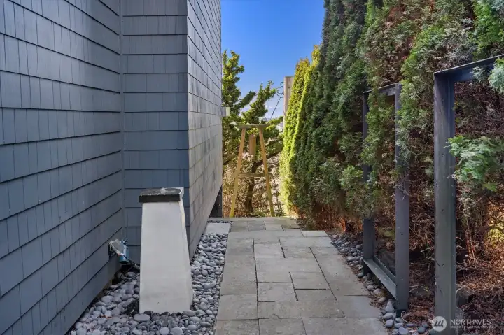 Water feature and traditional Asian gong