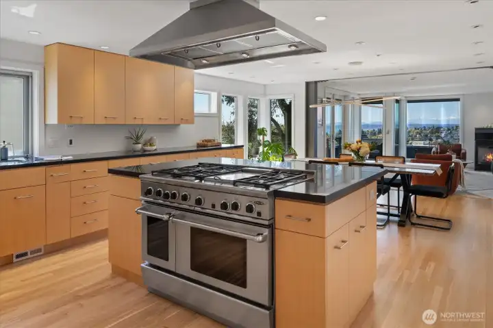 Kitchen with commercial grade stove and double oven