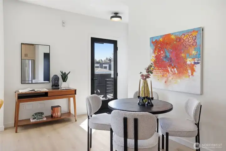 Well lit main level living, custom lighting throughout.