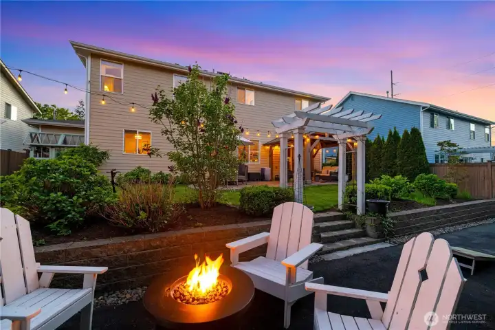 The fire pit in the backyard is the perfect place to unwind.