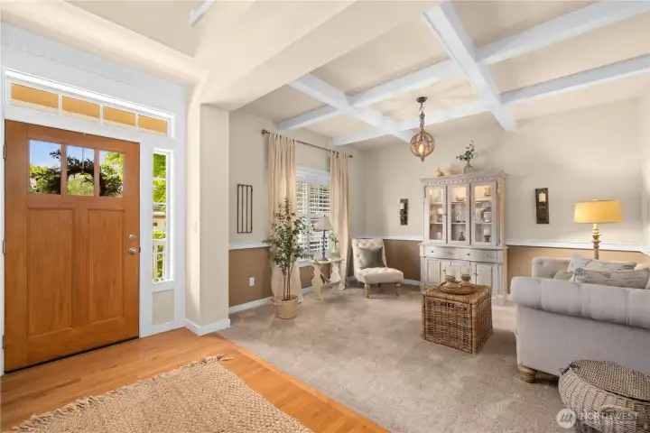 Enter to the living room off the front door.