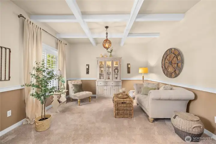 The front room offers the perfect spot to talk away from the kitchen/dining area.