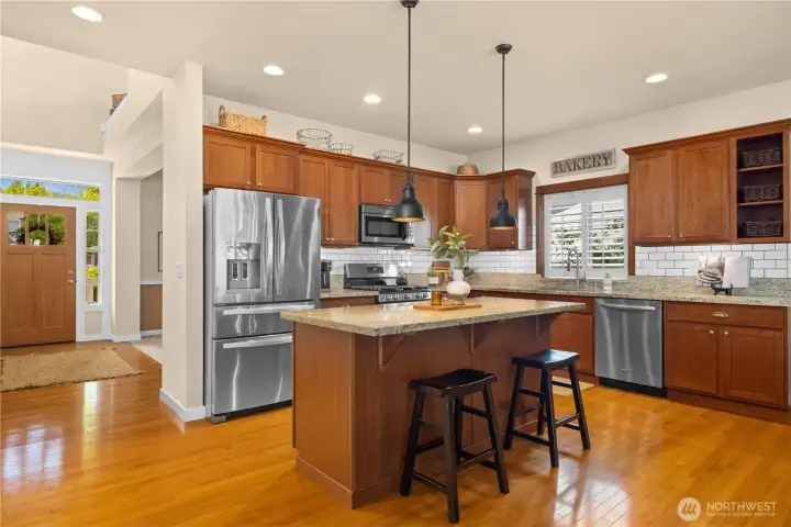 Stainless steel appliances in the kitchen.