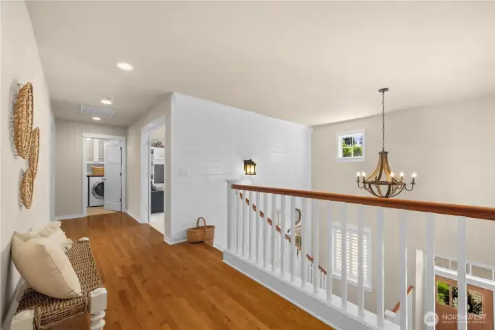 Upstairs landing flows to the bedrooms and bonus room.