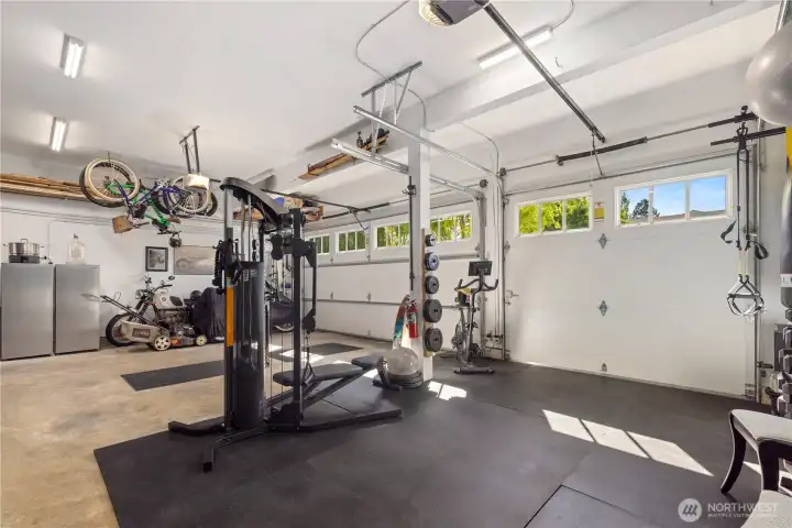 The three car garage is super roomy with some extra shop space.