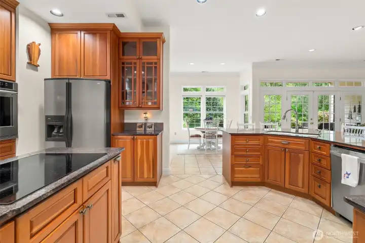 Open layout means chef won't miss conversations with guests in the great room.