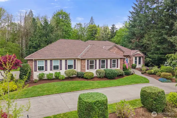 Gorgeous custom home in an amazingly beautiful setting, and just steps away from Black Lake.