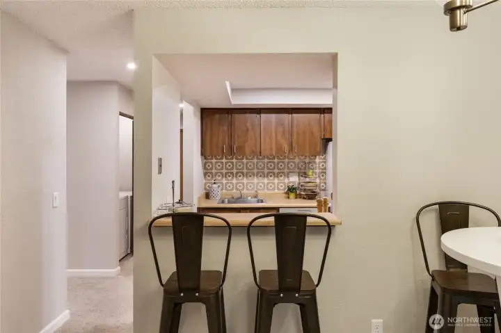 Bar height stools at the counter allow an alternative to table seating.