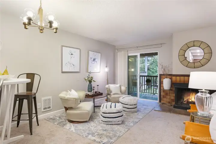 Dining/living room extends to outdoor balcony. Even a relatively small condo can be conducive to entertaining guests.