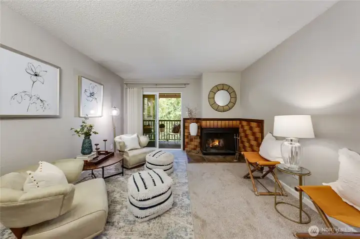 Original fireplace surround is a bold focal point of living room.
