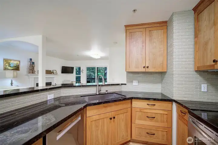Open, social layout keeps the chef connected to the main living areas.