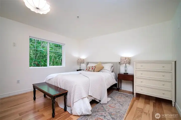 Enjoy lovely forest views and engineered hardwoods.