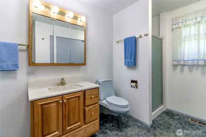 Primary Bathroom 3/4 With extra closet space