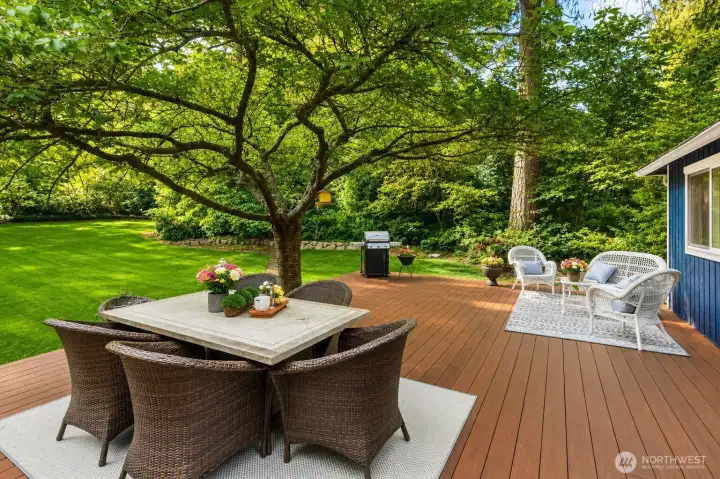 Flat land, sports court, huge deck, hot-tub, detached work area.