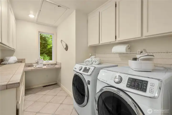 Upstairs laundry room and desk space