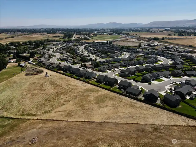 Looking east over property toward town