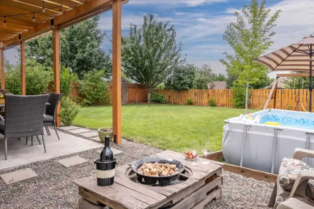 Outdoor living has room for firpit, dining ...