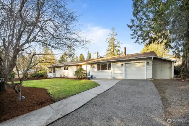 Welcome home to this charming rambler! Sun kissed with natural light, great driveway space for parking and an abundance of indoor and outdoor storage